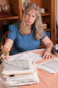 Woman studying genealogy